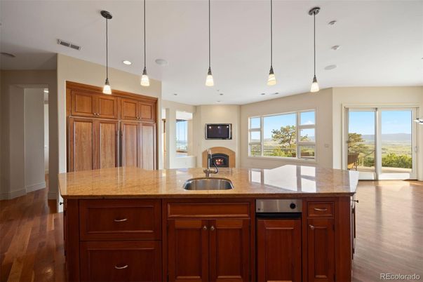 Fireplace, Interior, Kitchen, Pendant Lights, Recessed Lighting, Wood Texture Flooring