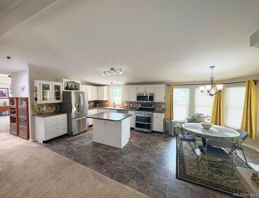 Chandelier, Dining room, Interior, Kitchen, Pendant Lights, Stainless Steel Appliances