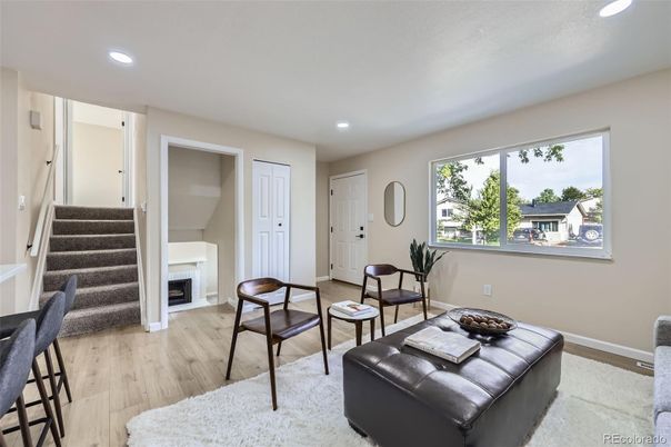 Fireplace, Interior, Living room, Recessed Lighting, Wood Texture Flooring