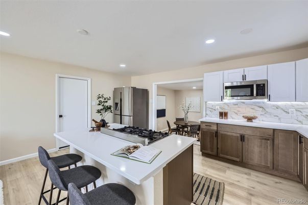 Dining room, Interior, Kitchen, Recessed Lighting, Stainless Steel Appliances, Wood Texture Flooring