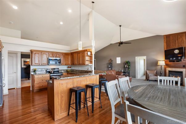 Dining room, Fireplace, Interior, Kitchen, Pendant Lights, Recessed Lighting, Wood Texture Flooring