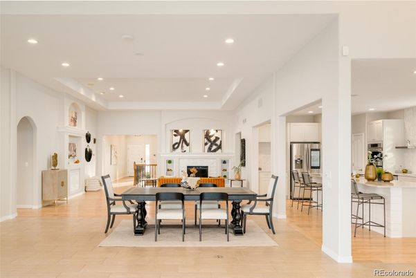 Dining room, Fireplace, Interior, Kitchen, Recessed Lighting, Stainless Steel Appliances, Wood Texture Flooring