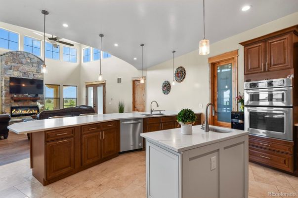 Fireplace, Interior, Kitchen, Pendant Lights, Recessed Lighting, Stainless Steel Appliances