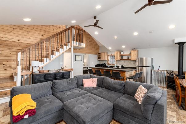 Dining room, Interior, Kitchen, Living room, Recessed Lighting, Stainless Steel Appliances, Wooden Ceilings, Wooden Walls