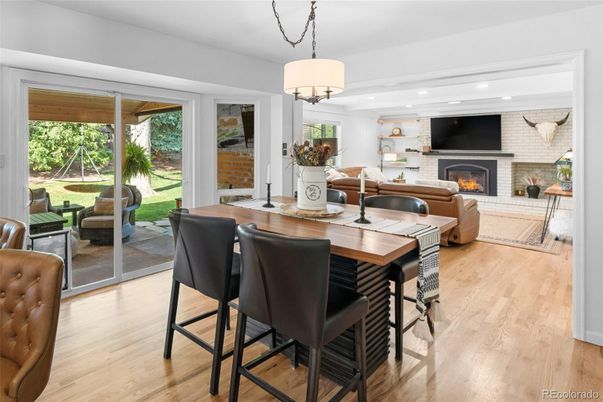 Dining room, Fireplace, Interior, Living room, Pendant Lights, Recessed Lighting, Stone Walls, Wood Texture Flooring