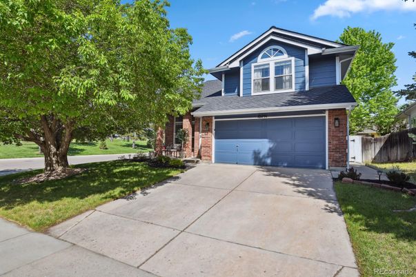 Attached, Exterior, Facade, Brick Facade, American Craftsman