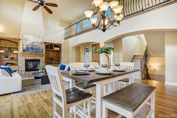 Chandelier, Dining room, Fireplace, Interior, Living room, Recessed Lighting, Wood Texture Flooring