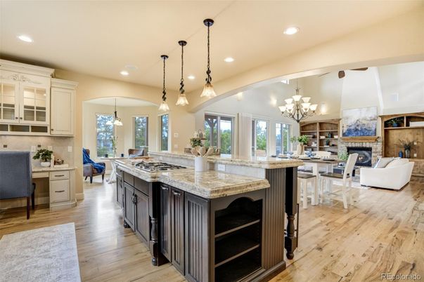 Chandelier, Dining room, Fireplace, Interior, Kitchen, Living room, Pendant Lights, Recessed Lighting, Wood Texture Flooring