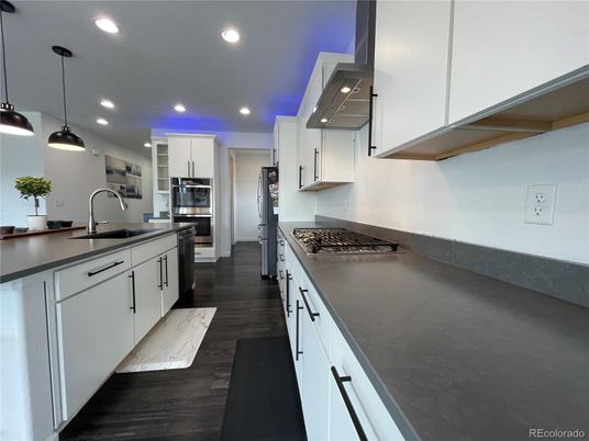 Interior, Kitchen, Pendant Lights, Recessed Lighting, Stainless Steel Appliances, Wood Texture Flooring