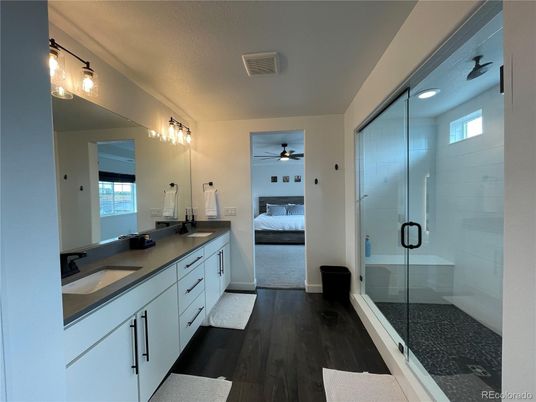 Bathroom, Bedroom, Dual Sink Vanities, Glass Shower, Interior, Wood Texture Flooring