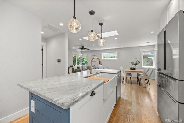 Dining room, Interior, Kitchen, Pendant Lights, Recessed Lighting, Stainless Steel Appliances, Wood Texture Flooring