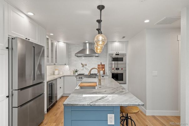 Interior, Kitchen, Pendant Lights, Recessed Lighting, Stainless Steel Appliances, Wood Texture Flooring