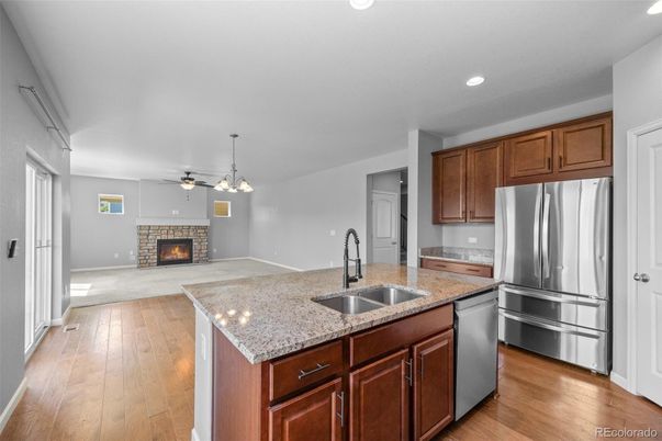 Fireplace, Interior, Kitchen, Pendant Lights, Recessed Lighting, Wood Texture Flooring