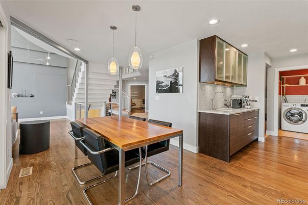 Dining room, Interior, Kitchen, Pendant Lights, Recessed Lighting, Utility Closets, Washer, Wood Texture Flooring