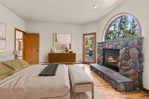 Bedroom, Fireplace, Interior, Recessed Lighting, Wood Texture Flooring