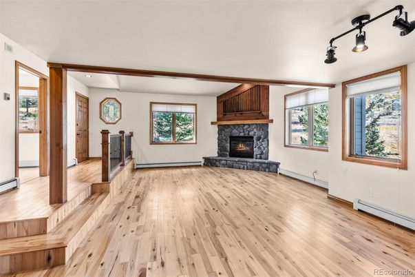 Empty room, Fireplace, Interior, Recessed Lighting, Wood Texture Flooring