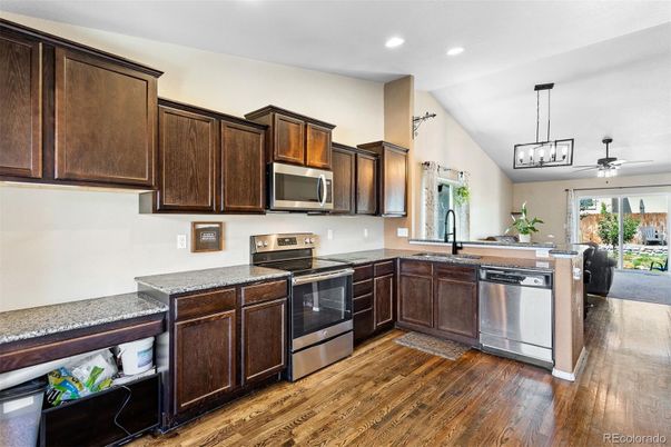 Interior, Kitchen, Pendant Lights, Recessed Lighting, Stainless Steel Appliances, Wood Texture Flooring