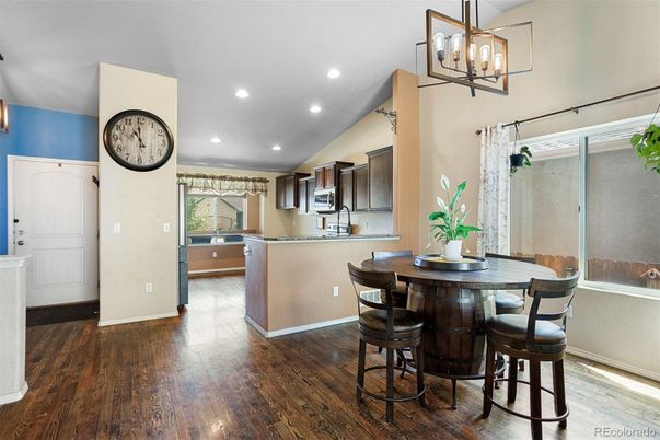 Dining room, Interior, Kitchen, Pendant Lights, Recessed Lighting, Stainless Steel Appliances, Wood Texture Flooring