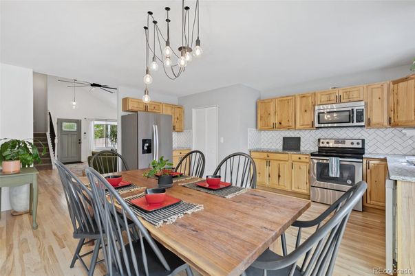 Dining room, Interior, Kitchen, Pendant Lights, Stainless Steel Appliances, Wood Texture Flooring