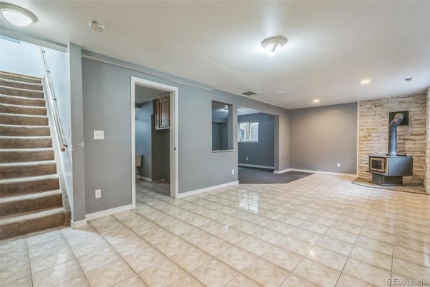 Empty room, Fireplace, Interior, Recessed Lighting, Stone Walls