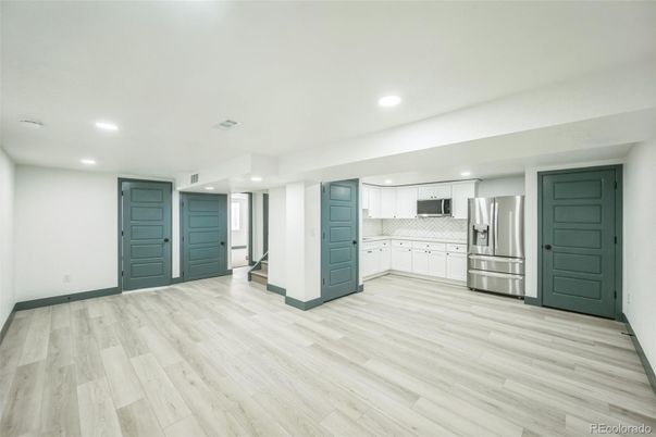 Interior, Kitchen, Recessed Lighting, Stainless Steel Appliances, Wood Texture Flooring