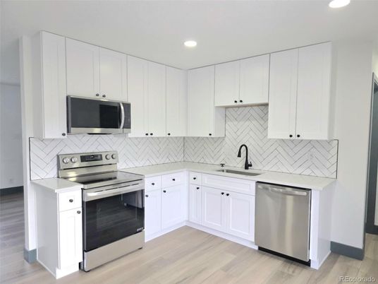 Interior, Kitchen, Recessed Lighting, Stainless Steel Appliances, Wood Texture Flooring