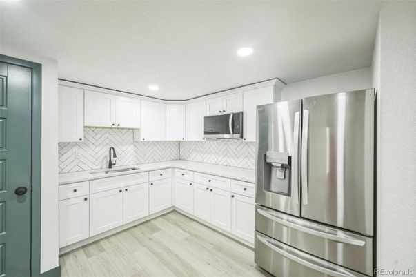 Interior, Kitchen, Recessed Lighting, Stainless Steel Appliances, Wood Texture Flooring