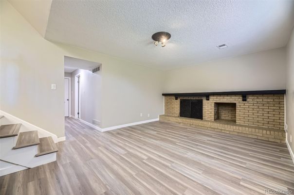 Empty room, Fireplace, Interior, Stone Walls, Wood Texture Flooring