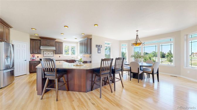 Dining room, Interior, Kitchen, Pendant Lights, Recessed Lighting, Stainless Steel Appliances, Wood Texture Flooring
