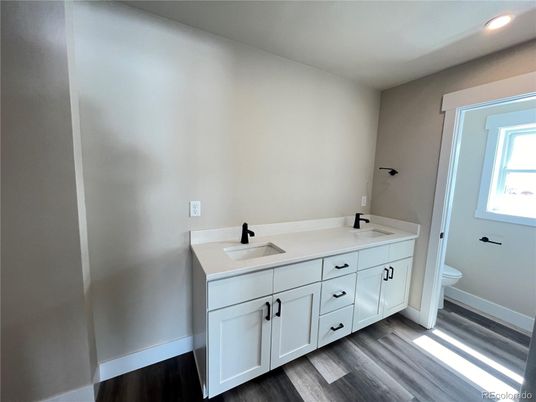 Bathroom, Dual Sink Vanities, Interior, Recessed Lighting, Wood Texture Flooring