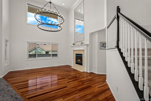 Fireplace, Interior, Pendant Lights, Recessed Lighting, Wood Texture Flooring