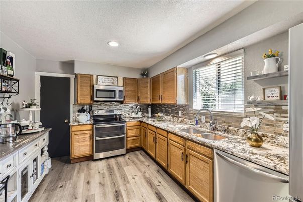 Interior, Kitchen, Recessed Lighting, Stainless Steel Appliances, Wood Texture Flooring