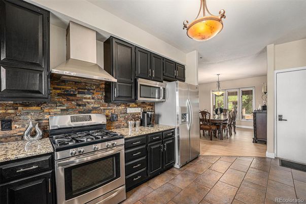 Dining room, Interior, Kitchen, Pendant Lights, Stainless Steel Appliances, Wood Texture Flooring