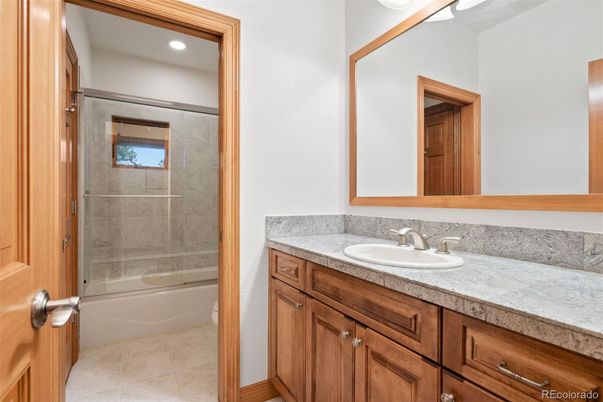 Bathroom, Glass Shower, Interior, Recessed Lighting, Tile Countertops