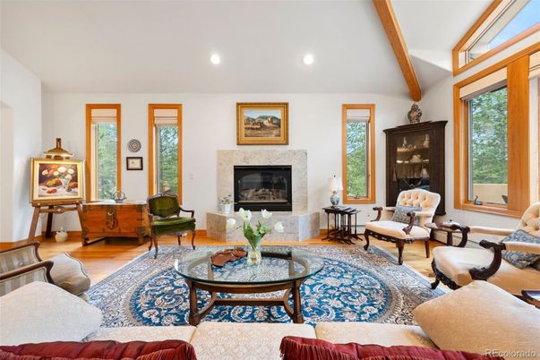 Fireplace, Interior, Living room, Recessed Lighting, Wooden Beams, Wood Texture Flooring