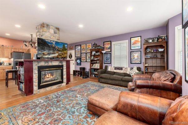 Fireplace, Interior, Kitchen, Living room, Recessed Lighting, Stone Walls, Wood Texture Flooring