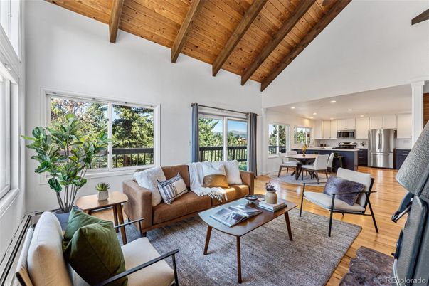 Dining room, Interior, Kitchen, Living room, Recessed Lighting, Stainless Steel Appliances, Wooden Beams, Wooden Ceilings, Wood Texture Flooring