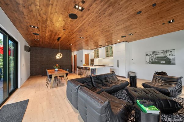Dining room, Interior, Kitchen, Living room, Pendant Lights, Recessed Lighting, Stone Walls, Wooden Ceilings, Wood Texture Flooring