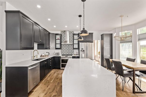 Dining room, Interior, Kitchen, Pendant Lights, Recessed Lighting, Stainless Steel Appliances, Wood Texture Flooring