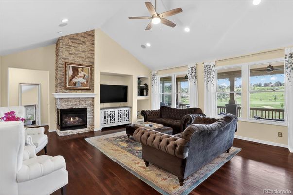 Fireplace, Interior, Living room, Recessed Lighting, Stone Walls, Wood Texture Flooring