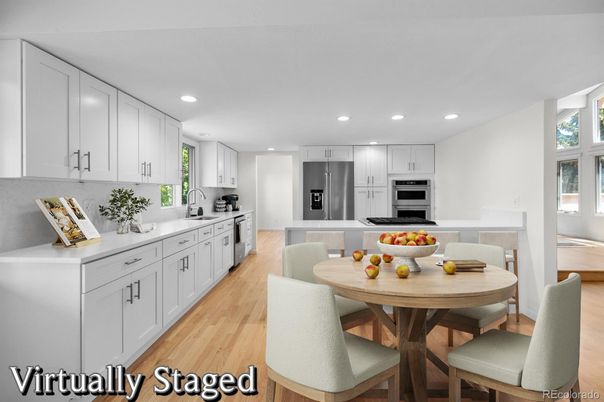 Dining room, Interior, Kitchen, Recessed Lighting, Stainless Steel Appliances, Wood Texture Flooring