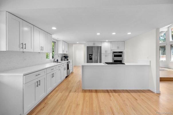Interior, Kitchen, Recessed Lighting, Stainless Steel Appliances, Wood Texture Flooring