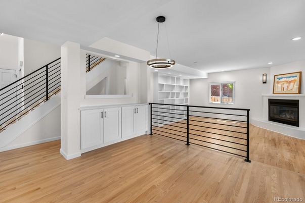 Fireplace, Interior, Pendant Lights, Recessed Lighting, Wood Texture Flooring