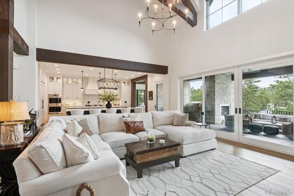 Chandelier, Interior, Kitchen, Living room, Pendant Lights, Recessed Lighting, Stainless Steel Appliances, Wooden Beams, Wood Texture Flooring