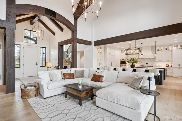 Chandelier, Interior, Kitchen, Living room, Pendant Lights, Recessed Lighting, Stainless Steel Appliances, Wooden Beams, Wood Texture Flooring