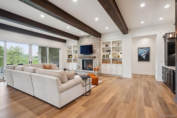 Fireplace, Interior, Living room, Recessed Lighting, Stone Walls, Wooden Beams, Wood Texture Flooring