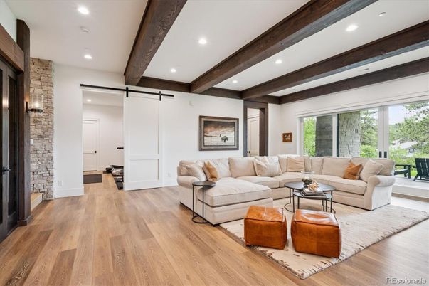 Fireplace, Interior, Living room, Recessed Lighting, Stone Walls, Wooden Beams, Wood Texture Flooring