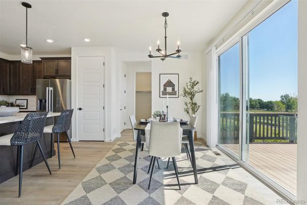 Dining room, Interior, Kitchen, Pendant Lights, Recessed Lighting, Stainless Steel Appliances, Wood Texture Flooring