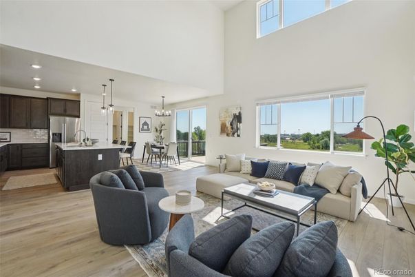 Chandelier, Dining room, Interior, Kitchen, Living room, Pendant Lights, Recessed Lighting, Stainless Steel Appliances, Wood Texture Flooring