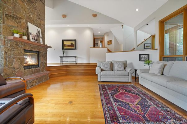 Fireplace, Interior, Recessed Lighting, Stone Walls, Wood Texture Flooring